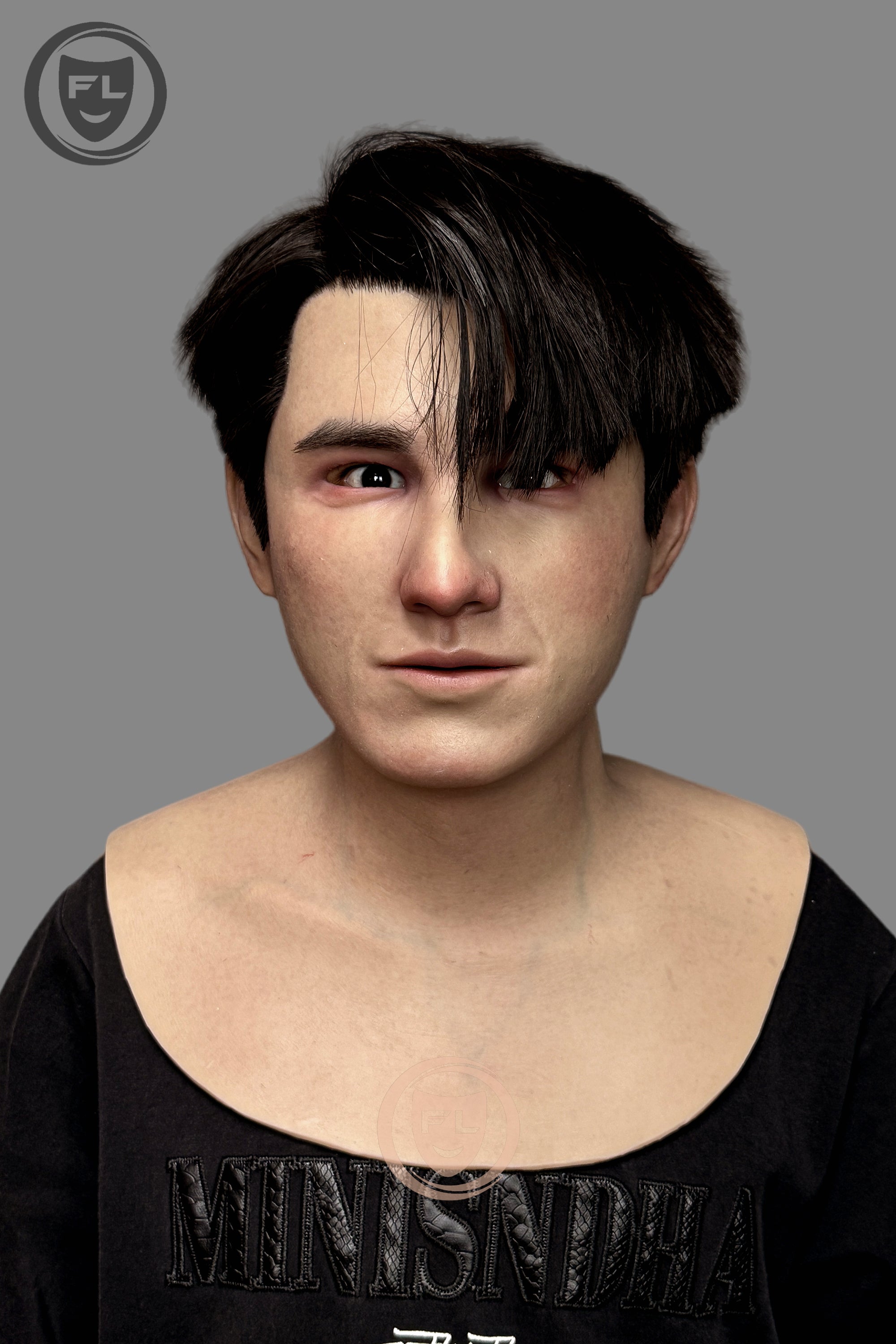 Young male silicone mask with black hair front view
