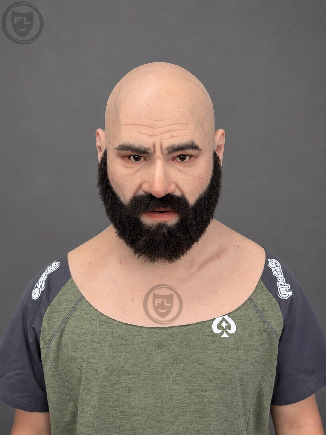 muscular bald male silicone mask with black beard worn front view
